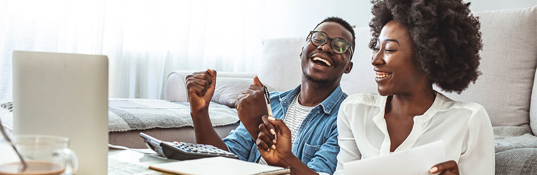 Happy Couple with Laptop