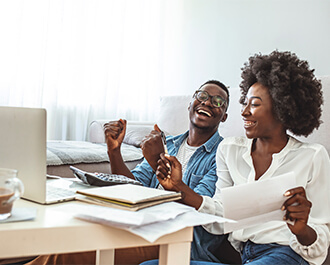 Happy Couple with Laptop