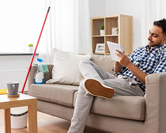 man sitting on couch 