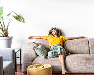 girl laid back on sofa