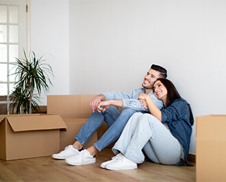 Couple with moving boxes